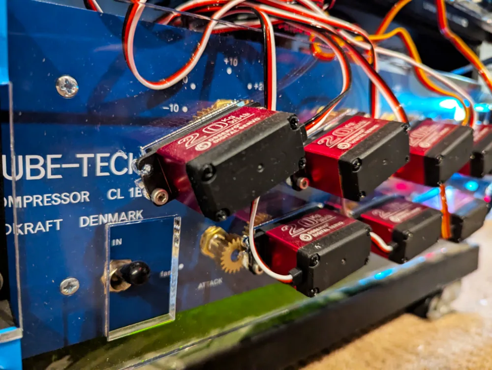 A real Tube-Tech CL 1B fitted with Access Analog robotic servos on its front panel, controlled remotely from the DAW.